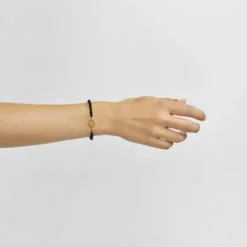Pulsera con baño de oro 18 kt sobre plata y ónix TOUS MANIFESTO